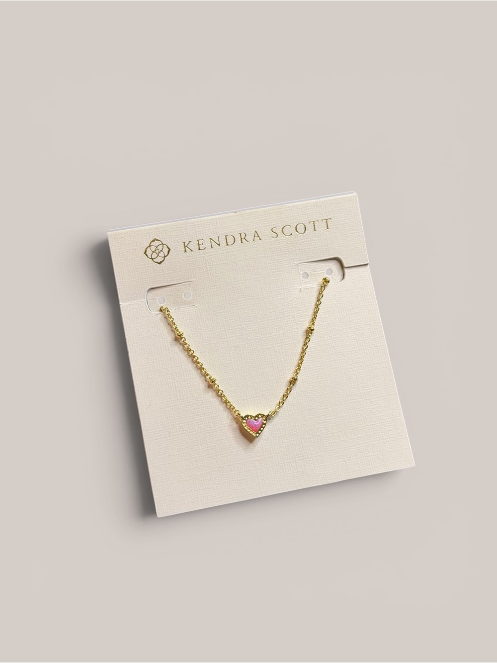 Kendra Scott iridescent bubblegum pink heart satellite gold necklace